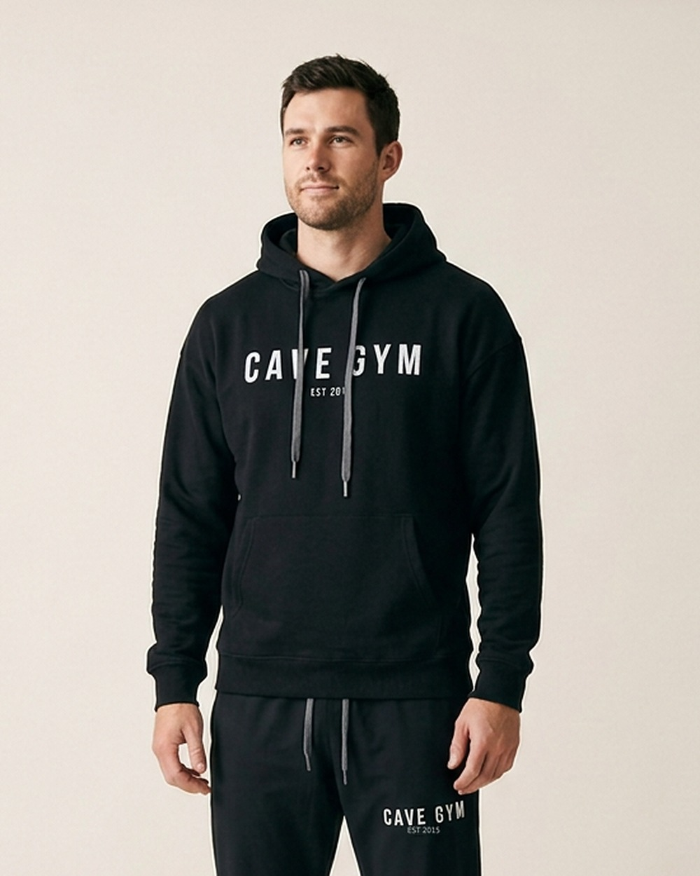 Pullover Hoodie by The Cave Gym worn by model