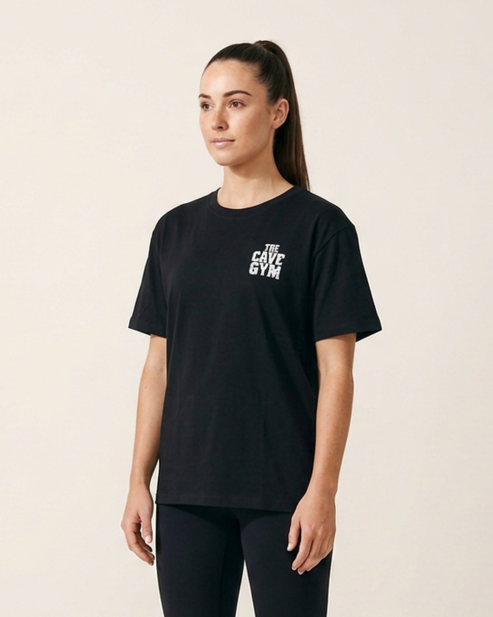 10 Year Anniversary T-Shirt by The Cave Gym worn by model